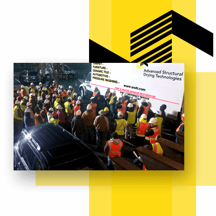 A picture of ASDT team members gathered at a working site